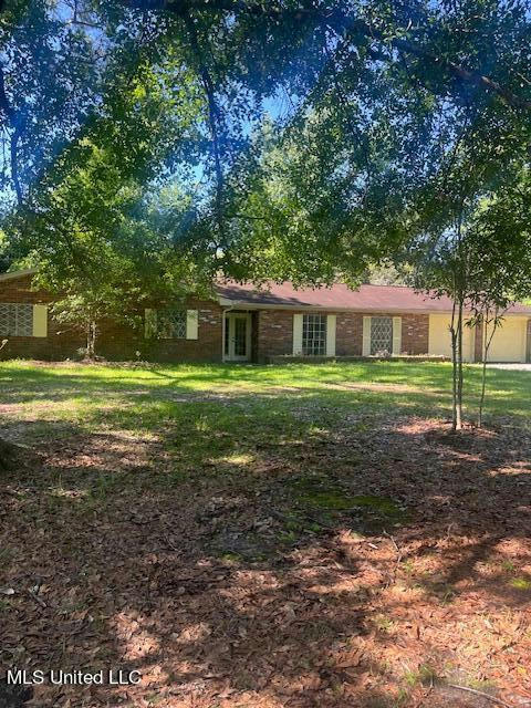 115 WOODMONT DR, PICAYUNE, MS 39466, photo 1 of 12